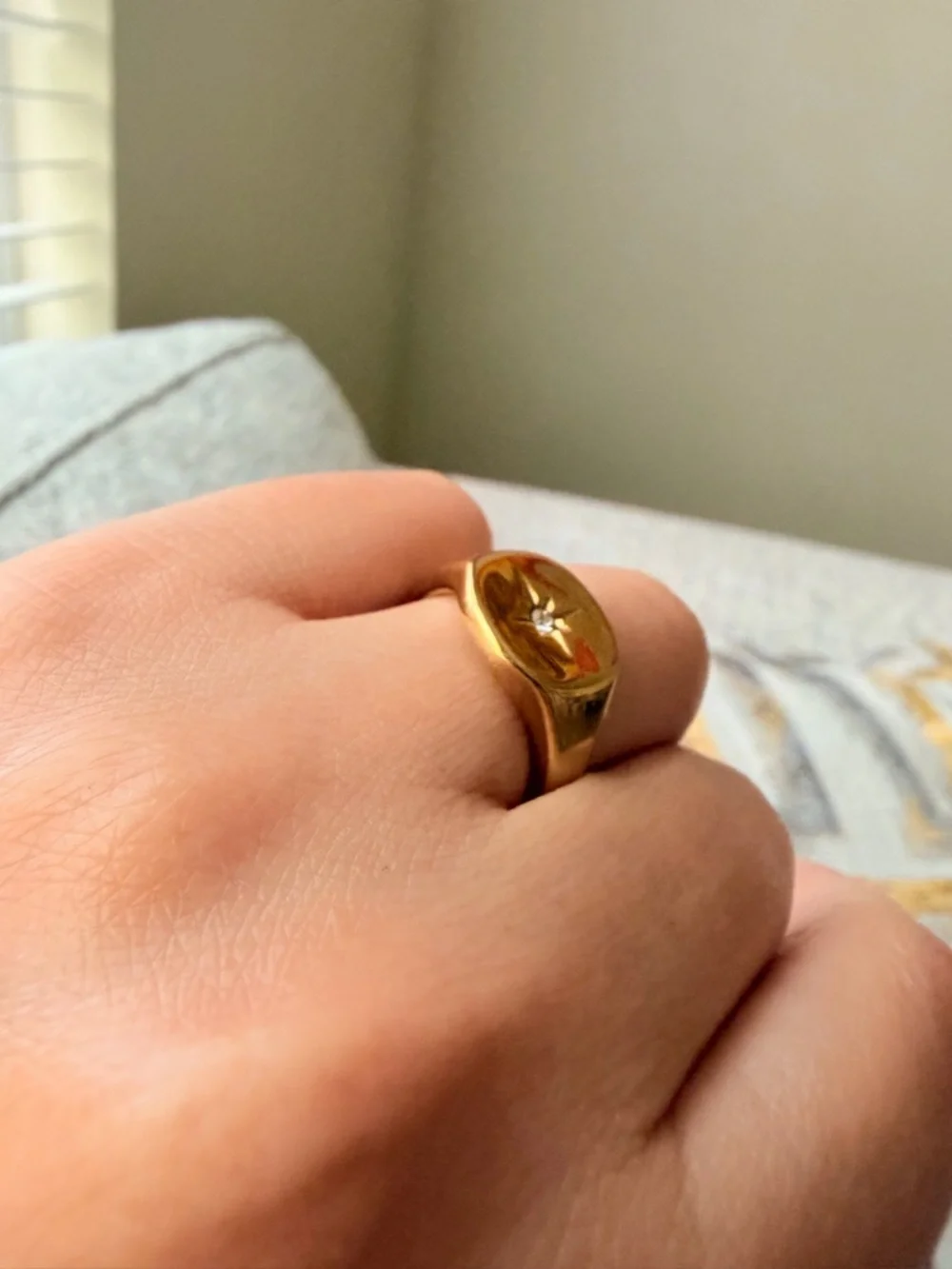 Gold Starburst Signet Ring with White Gemstone